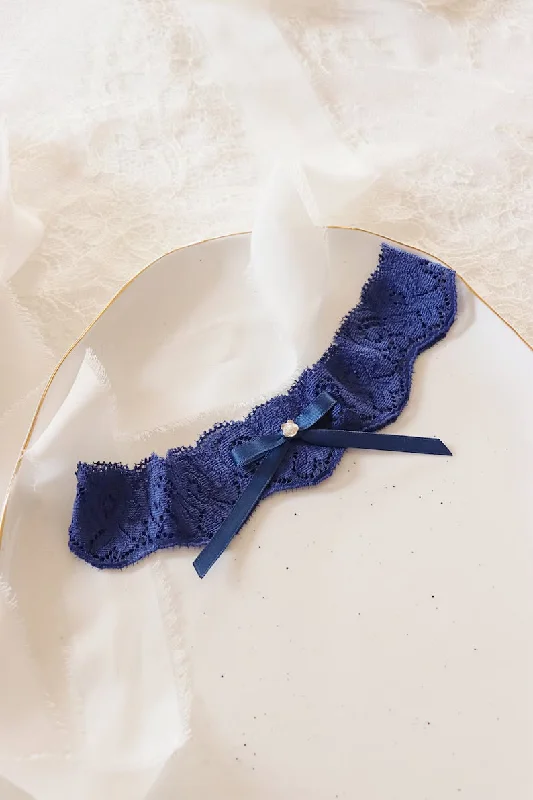 eco - friendly women garters materialsSingle scalloped navy blue lace wedding garter with bow and silver flower