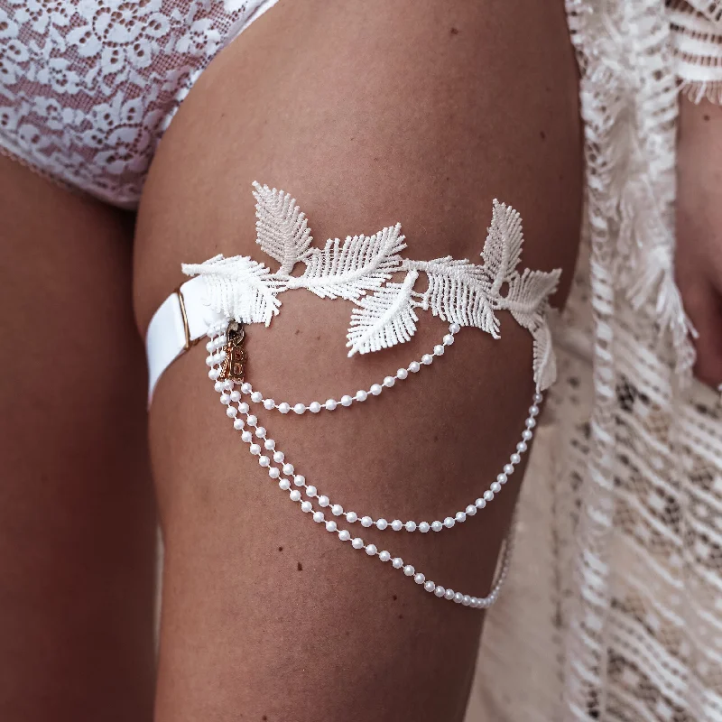 fishnet women garters textureDove Feather Garter With Pearls