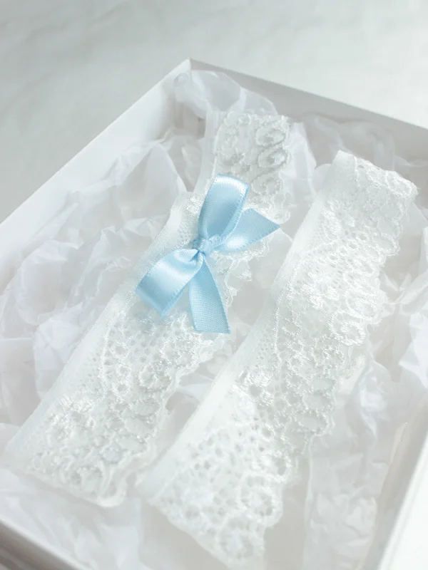 back - fastening women gartersEMMA | Simple Light Ivory Lace Wedding Garter Set with Blue Bow